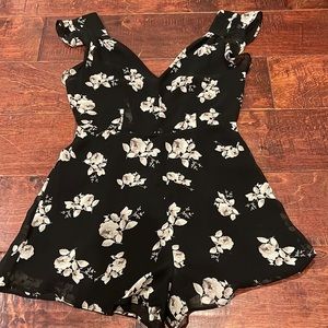 Black with white flowers romper